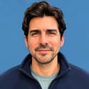 Daniel Echeverri, founder of Alma Terra Partners, smiling in a navy jacket